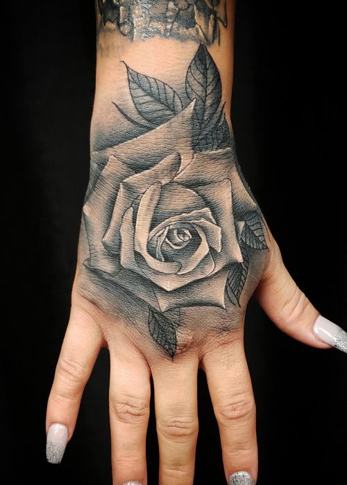 Rose Hand Tattoo - Heatstroke Tattoo
